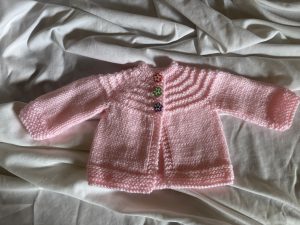 hand knit pink baby sweater