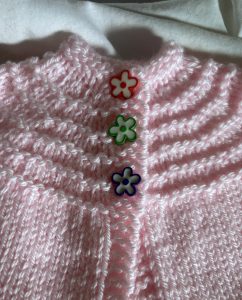hand knit pink baby sweater