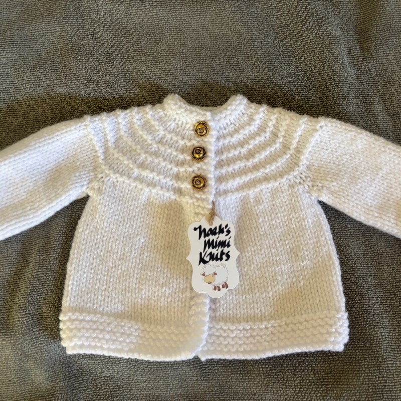 Hand Knit White Baby Sweater with Classic Rose Gold-Colored Buttons